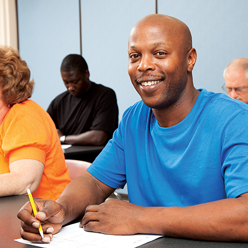 Student in class preparing for GED® Test.